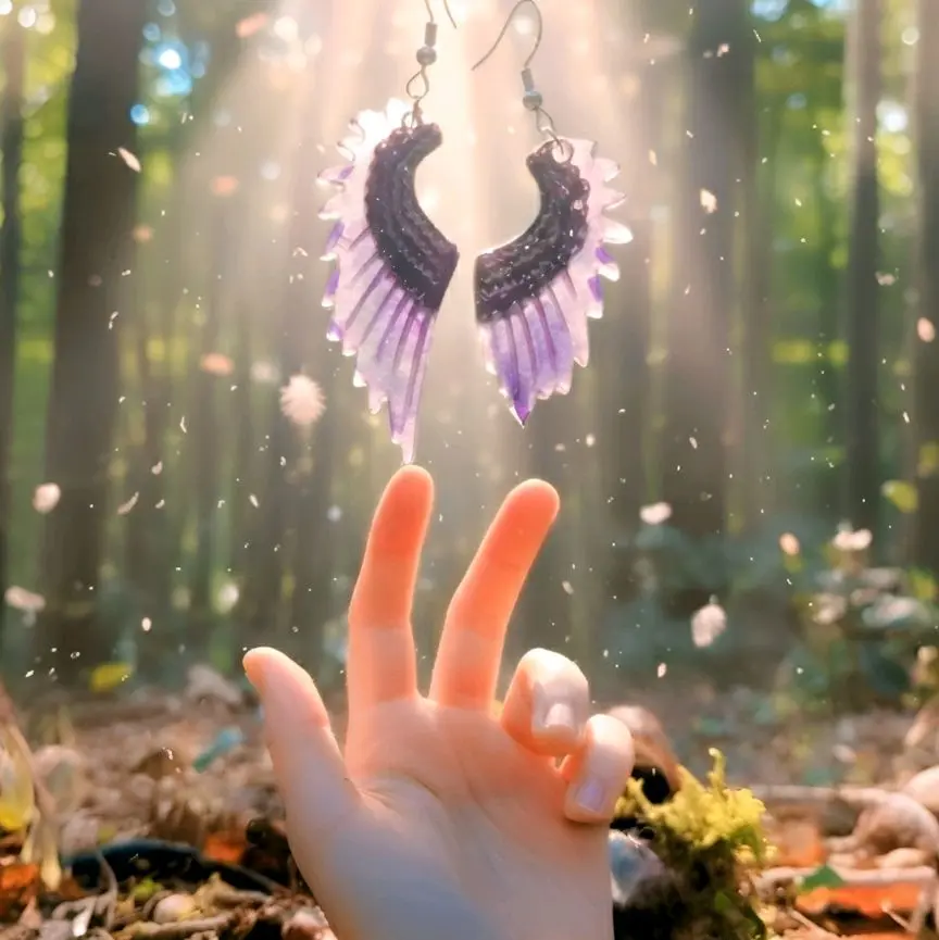Still I Fly (Broken Wing Earrings)  “From heaven’s battlefield fell a feather, torn and imperfect. But it carried the vow: ‘Even with broken wings, still I fly.’ These relics remember the will to soar when the sky says you can’t.”