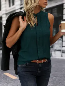 A women's dark green stand-up collar sleeveless textured top, commuting casual style loose slimming vest shirt, suitable for daily commuting, coffee shop visit, shopping and other wear.