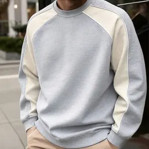 Men’s color-block contrast sweatshirt — new autumn Loose Fit sports top, casual base layer, trendy brand crewneck sweatshirt; men’s spring patchwork loose long-sleeve sweatshirt with a structured design; comfortable, breathable fabric suitable for all occ