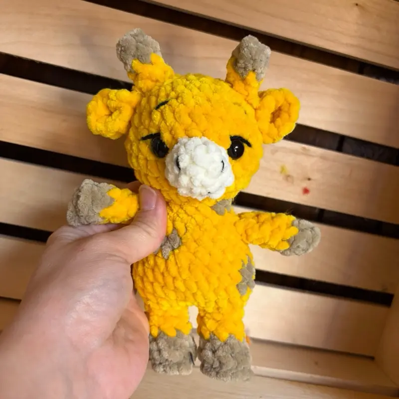 Tiny giraffe plush