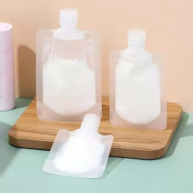 5Pcs Transparent Portable Fluid Packing Bags,New Travel Size Refillable Empty Squeeze Pouch, Premium Clear Travel Pouches for Toiletry, Lotion Shampoo Shower Gel Squeezable Bags (100ml),Bag and Cases