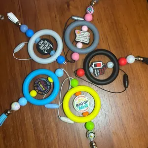 Car charm for rear view mirror