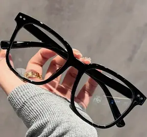 Unisex Glasses Transparent Black Frames With Face Contouring Design.Contemporary Campus Style For Men & Women. Perfect For Back-To-School Season & Fall Fashion.