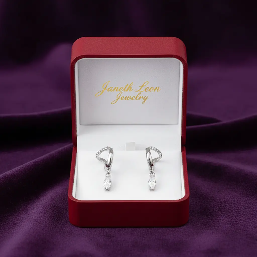 Platinum plated earrings with curved design and brilliant drop