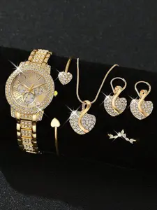6piece women's gold-tone stainless steel jewelry watch set includes a stylish vintage-inspired quartz watch with a diamond-encrusted dial, along with a heart-shaped bracelet, necklace, earrings, and ring. It makes the perfect holiday gift for a friend.