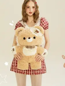 Gulibags A khaki bear backpack dressed in Lolita-style clothing—it serves as both a schoolbag and a plush toy, making it the perfect gift.