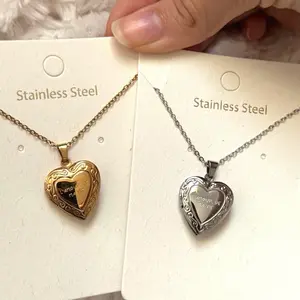 L’amour silver + gold heart locket stainless steel COMES WITH PHOTO SHOWN IN LISTING