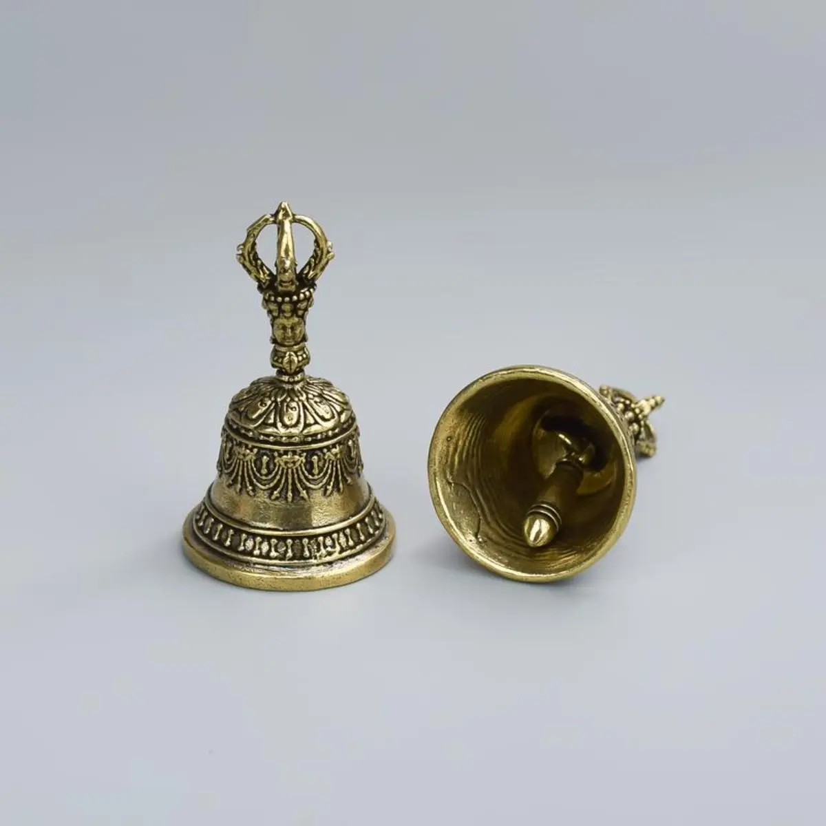 Traditional Hand-Carved Metal Bronze Handbell with Wooden Handle - Tuned Percussion Instrument with Clapper, Decorative Yet Functional Piece for Meditation, Ceremonies, Church Services