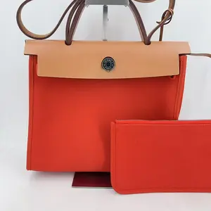 Pre-owned leather Crossbody Bags Hermes Vache Hunter Toile Herbag Zip Capucine Fauve