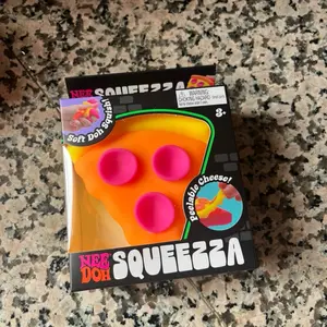Needoh Squeezza Peelable Unisex Stress Toy, Portable Tactile Fidget Item for Stress Relief Fidgeting