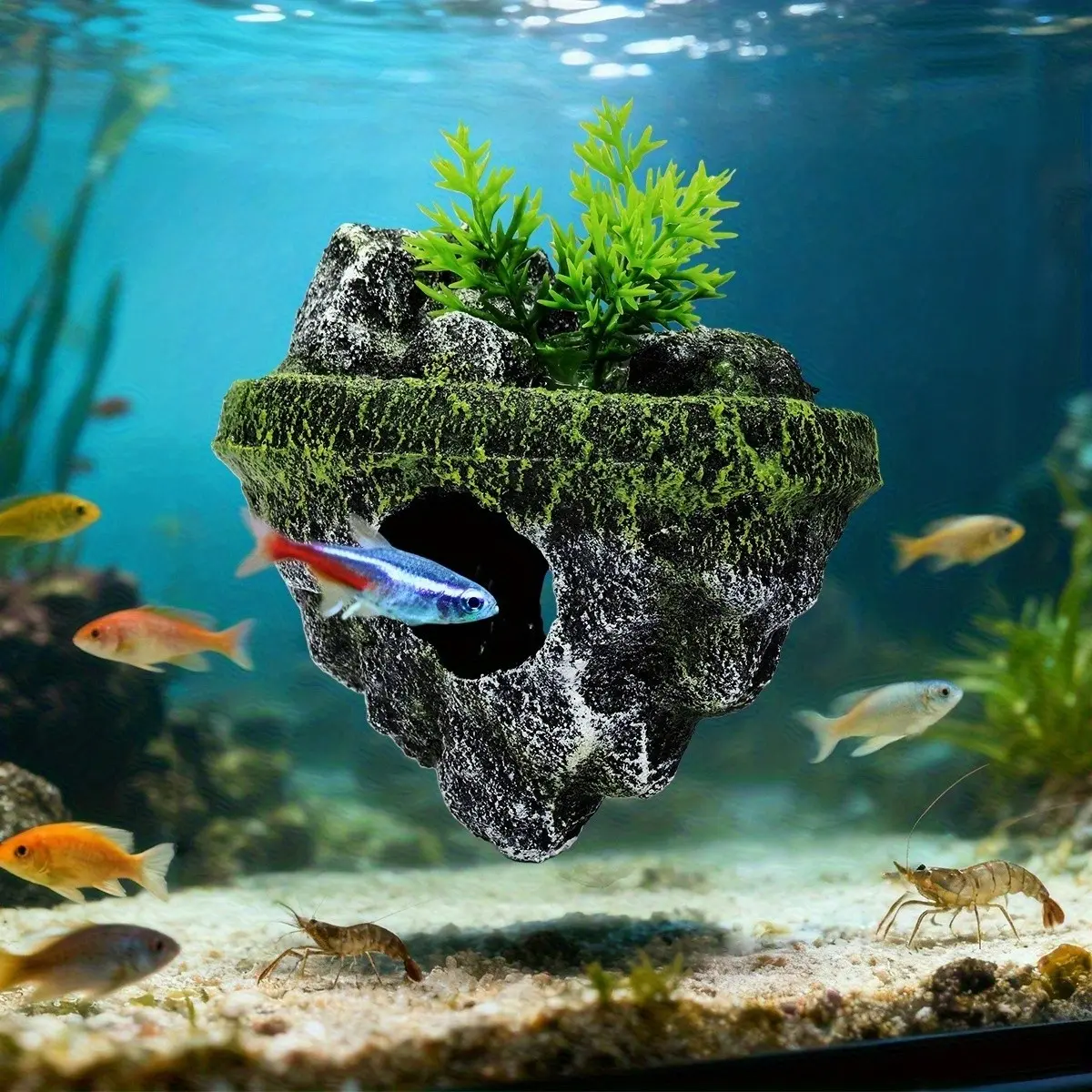 deco fish tank accessories MWYZGmold Aquarium Floating Island Decorations,Fish Decorations, Interactive Tank Toy for Betta Fish, Guppies, Goldfish, Shrimps, and Hermit Crabs : Pet Supplies Appears to glow under Blue LEDs Includes Cartoon Fish Tank Decor Figures