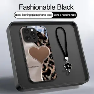 This phone case features a half-leopard print heart design, comes with a lanyard, is made of electroplated glass, is drop-proof and fingerprint-resistant, has a skin-friendly feel, and is compatible with iPhone 17, 16, 15, 14, 13, 12, 11, and other models