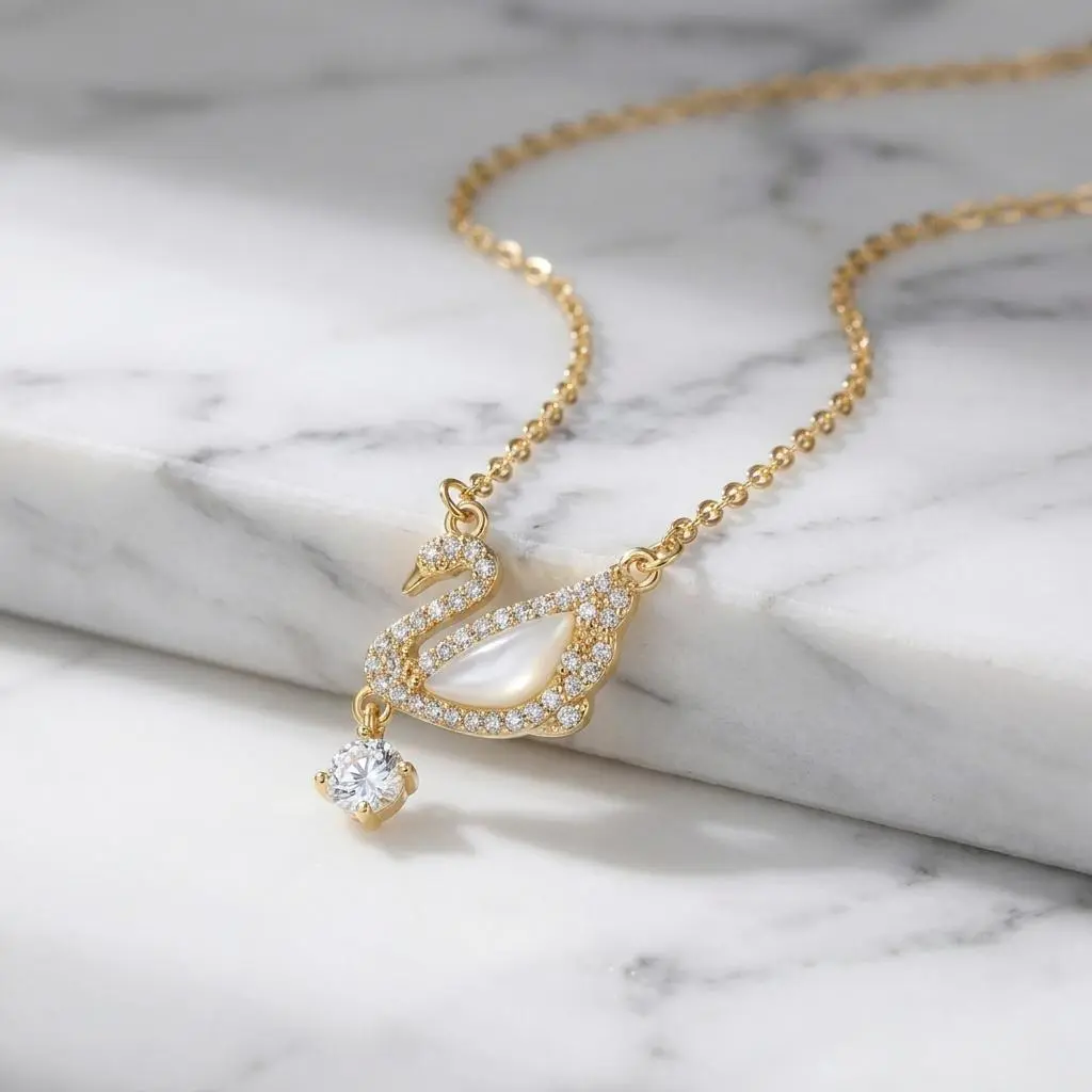 SANEFI Elegant Gold Swan Pendant – Mother of Pearl & CZ Necklace