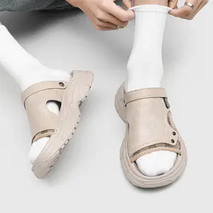 Men’s Suede Mix 2-Way Platform Slide Sandals. Beige suede-like leather combined with printed fabric panels, detachable heel strap secured by side snap buttons. Rugged lug platform sole delivers anti-slip grip and cushioning with subtle height boost.