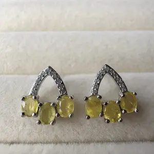 <PingEast jewelry > Classic sparkle — these 925 sterling silver stud earrings showcase three 3×5mm natural sapphires securely held in a delicate claw setting. Certified authenticity included