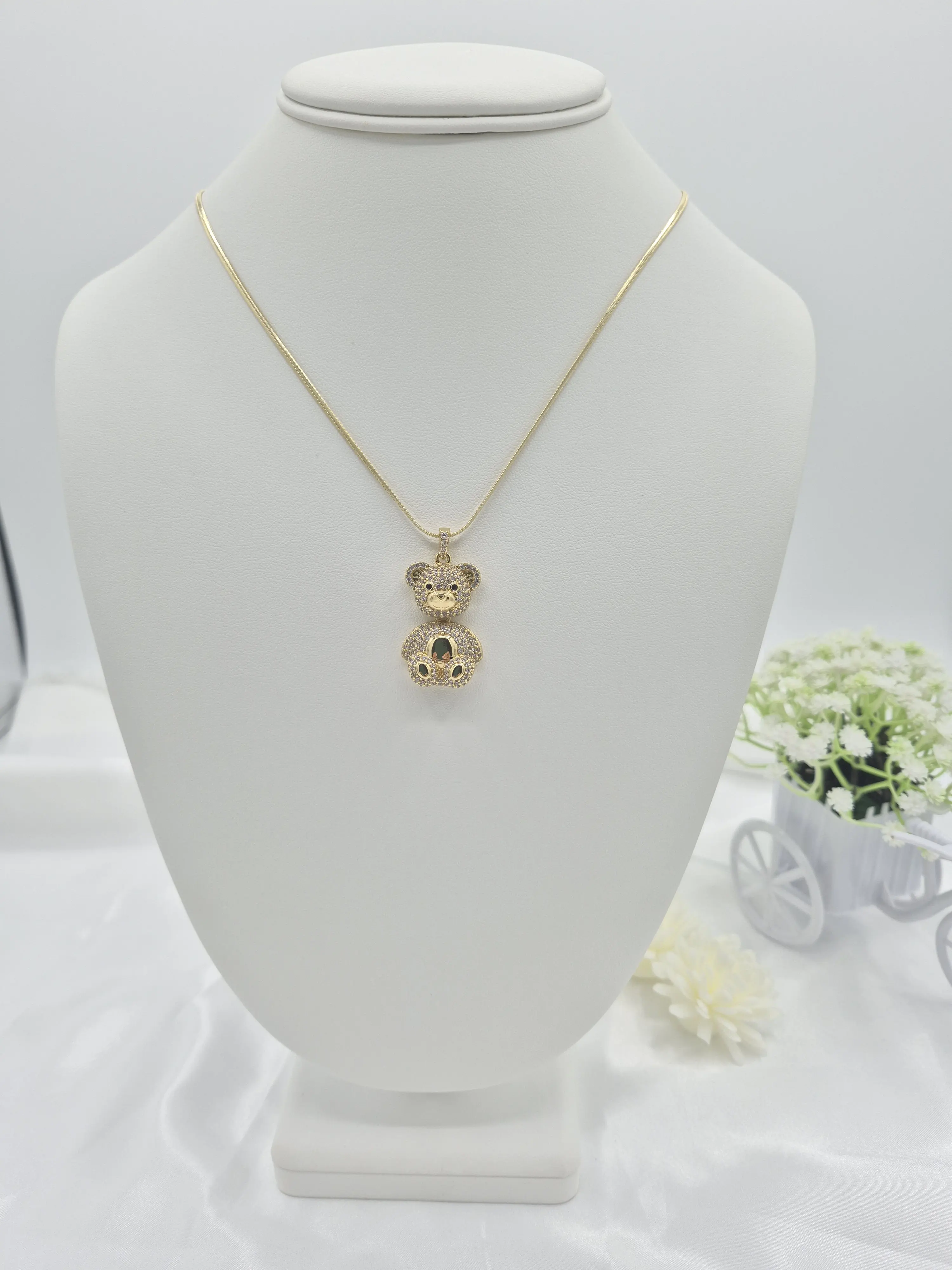 14k gold plated necklace with teddy bear pendant.  (84)