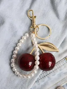Fashion retro bag accessories charm, cherry keychain, simple sweet cherry pendant accessory, small gift for female friends, holiday small gifts, cherry gold chain handbag pendant strap with pearl strand charm, girly purse fillers