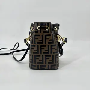 Pre-owned FENDI calfskin leather Bucket & Drawstring Bag Bi Color FF 1974 Embossed Mini Mon Tresor Bucket Bag