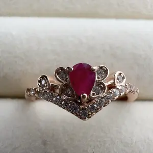 <PingEast jewelry >Ruby ring107----Fit for royalty — this 925 sterling silver ring showcases tiny 2mm natural Burmese pigeon blood glassy rubies set in a rose gold pavé crown design. A dazzling statement piece