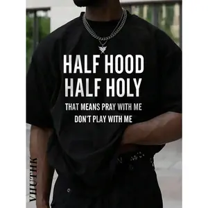 A T - shirt featuring the phrase “HALF HOOD HALF HOLY THAT MEANS PRAY WITH ME DON'T PLAY WITH ME”, showcasing a bold personal statement