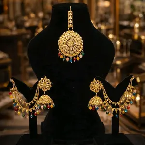 Gold plated sahare earring and tikka set. Gold plated sahare earring and tikka set.