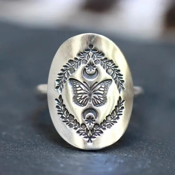 Vintage bohemian signet ring, carved with exquisite butterfly relief patterns, vintage distressed style, surrounding branch and leaf carvings, natural element style, unique and exaggerated ring, oval ring face to  the hand shape, a gift for her.