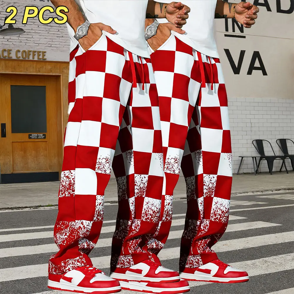 Men’s red and white checkered casual wide-leg pants, loose straight floor-length trousers, high-street distressed paint-splatter patchwork design, adjustable elastic waistband with drawstring, suitable for everyday outings and stylish styling.