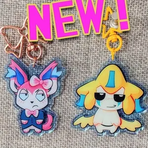 STARTERS movieunleashers keychains Double sided: Jirachi, Dr. Sylveon