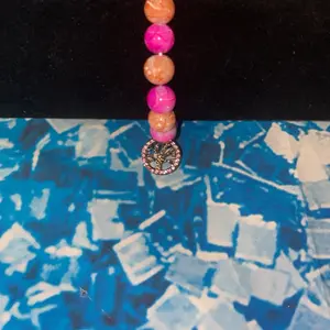 Pink and golden tree of life charm bead bracelet