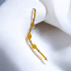 Oshun Orisha Ilde Santo Pulvera Santeria Yoruba Ifa Yellow Bead Bracelet with Gold Accents Cultural Symbol of Spiritual Significance