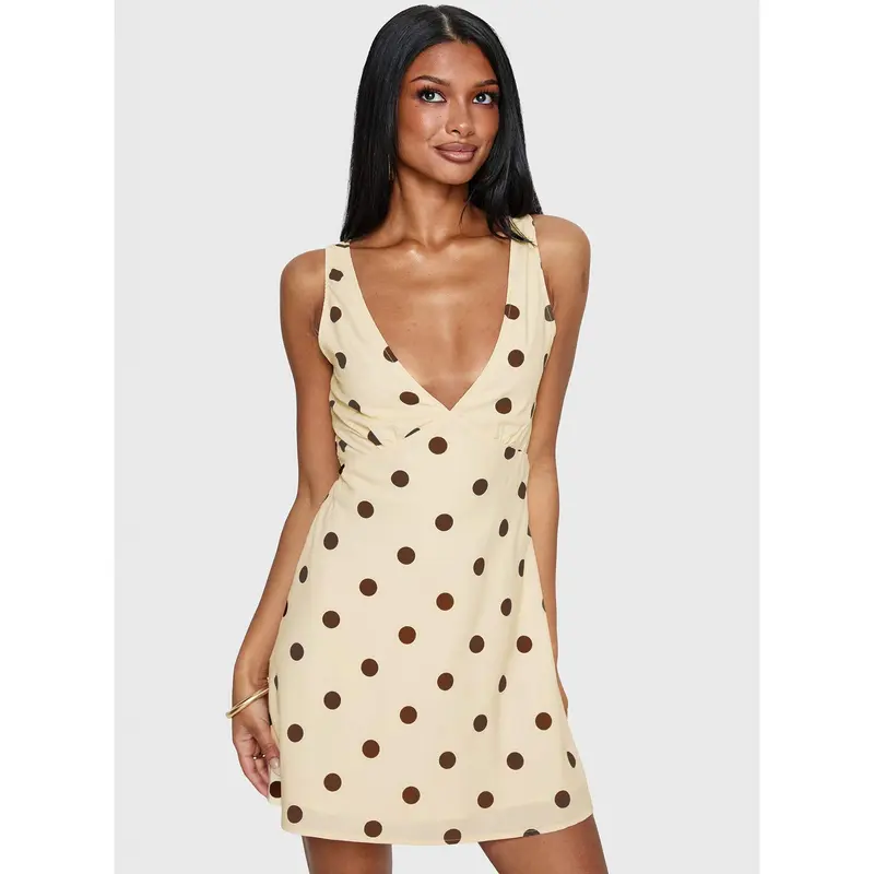 brown and white polka dot mini dress BABY GIRL POLKA DOT HALTER MINI DRESS – AKIRA main image 0