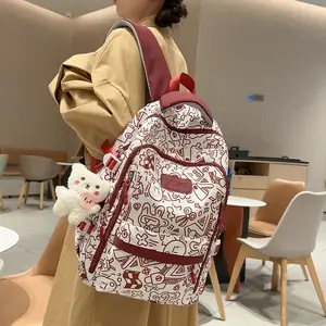 Stylish Unisex Backpack – New Model, Burgundy. Suitable for High School, Junior High, and College Students. Eye-catching Design – Perfect Holiday Gift.