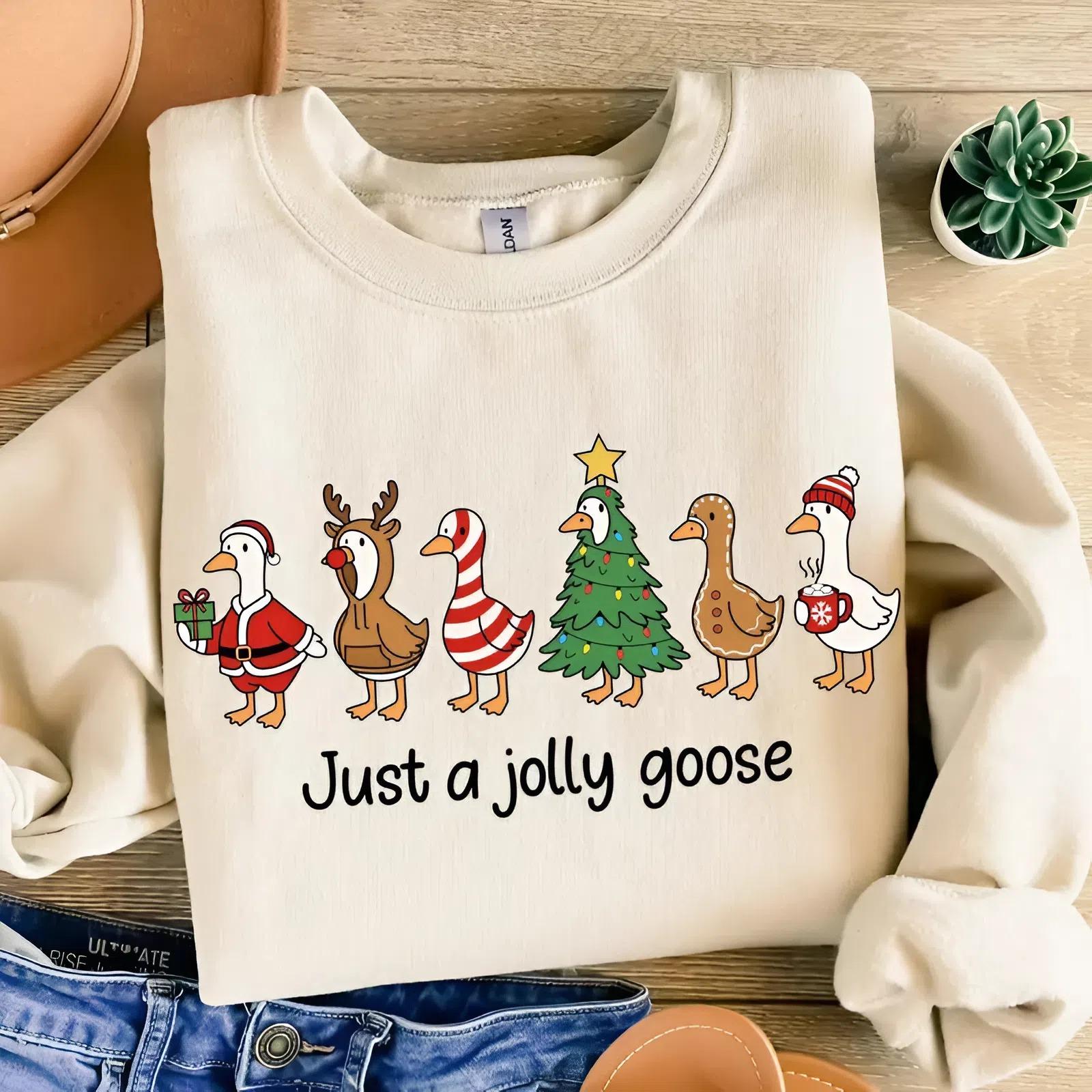 Just a Jolly Goose Funny Christmas youth and adult Sweatshirt, Trendy Christmas Season Graphic tee, jesus shirt, Trending tee, youth clothing, gift for son and daughter,holiday outfit, christmas shirt, goose christmas shirt