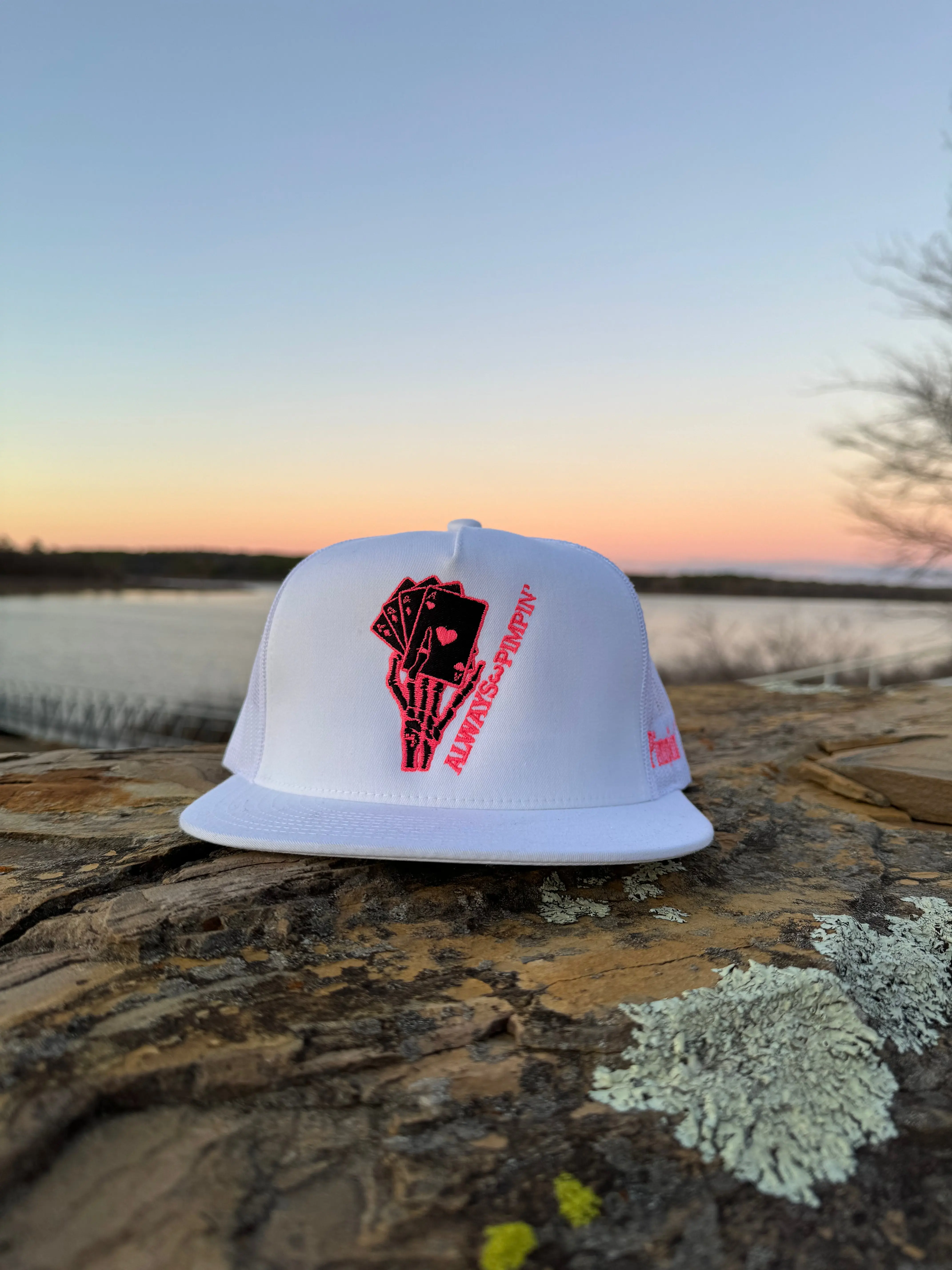 Unisex White Trucker Hat with Red and Black Design, Adjustable Strap, Ideal for Outdoor Activities