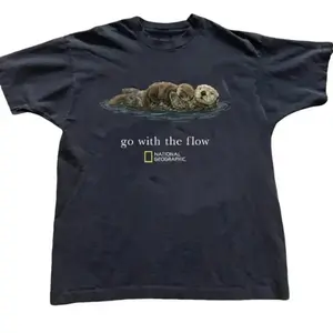 100% Cotton  comfortable and breathable, National Geographic "Go with the Flow" unisex T-shirt, gift Dark Humor