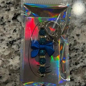 Regal Blue Ribbon Keychain with Sparkling Beads and Elegant Bow Design for Stylish Accessory
