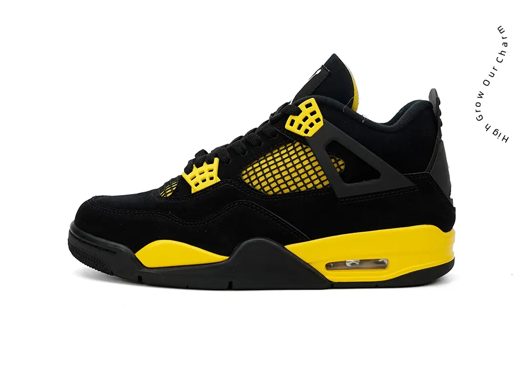 Mid-top vintage basketball trainers, all black bright yellow two-tone suede casual sneakers with hollow mesh panels, air cushioned layered rubber outsole, supportive breathable street footwear, non-slip bold fashion kicks for hip-hop outfits