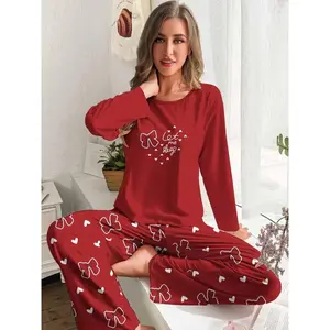 Women’s red heart-themed bow pattern pajama set, includes a long-sleeve round-neck top and elastic pants GARMENTARY