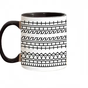 A uniquely creative new set of ceramic coffee utensils. The coffee cup contains hidden information and can be used as a gift or a present.Inside black, outside white - 350ml