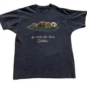 National Geographic with "Go with the flow" Baby Tee