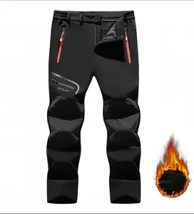 Men's long pants with multiple pockets and contrast colors, featuring an outdoor casual style. The contrast color details add a stylish touch, and the multiple pocket design meets storage needs. The patchwork fabric adds texture, and the loose fit allows