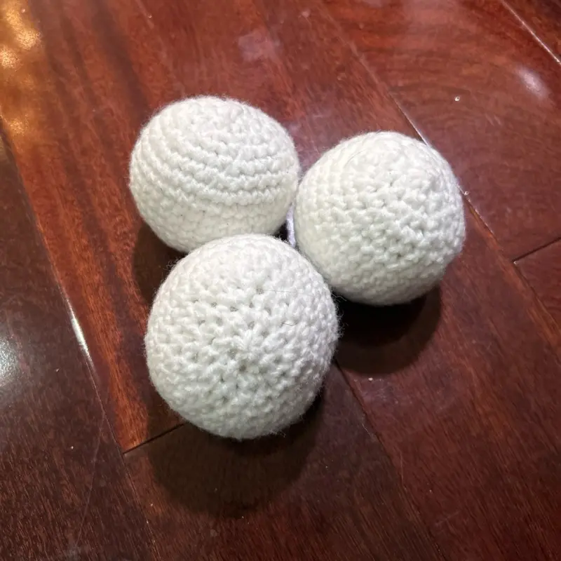 Crochet Juggling Snowballs - Handmade White Yarn Balls for Fun Winter Activities and Home Decor