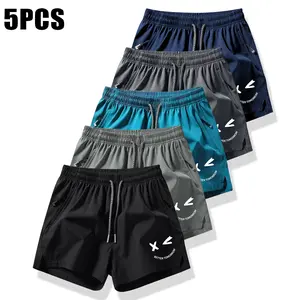 Men's summer quick-drying sports and casual shorts, breathable elastic fabric, smiley face print, adjustable drawstring belt and zipper pocket, durable and comfortable 5-piece men's clothing