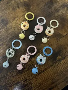 Donut Bell Keychain - 2.5" Long Metal Bell & Resin Donut Keychain with Colorful Rings - Fun & Unique Accessory