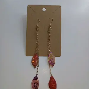 Dark pink hearts dangling resin earrings