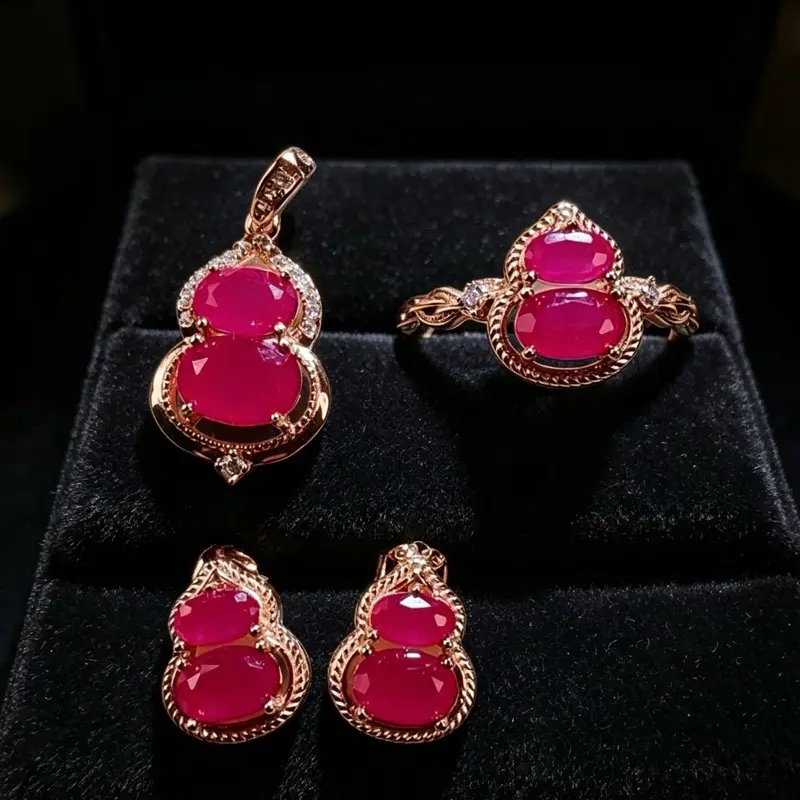 <PingEast Jewerly>Ruby Set--925 Sterling Silver Rose Gold Ruby Gourd Jewelry Set Crafted in 925 sterling silver with a romantic rose gold finish, this elegant gourd jewelry set features natural pink rubies from the famous Mogok mining area of Myanmar. The