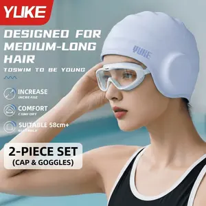 2-piece swim cap and goggles set designed to protect your ears and fit long hair perfectly