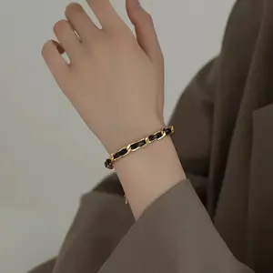 Elegant Gold-Tone Chain Bracelet with Black Accents for Women's Fashion Accessories