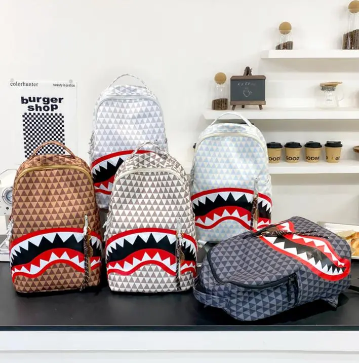 {Free pendant}Shark mouth backpack with stylish geometric pattern, available in multiple colors, suitable for everyday use. A quirky and creative shark-themed backpack for travel and commuting.