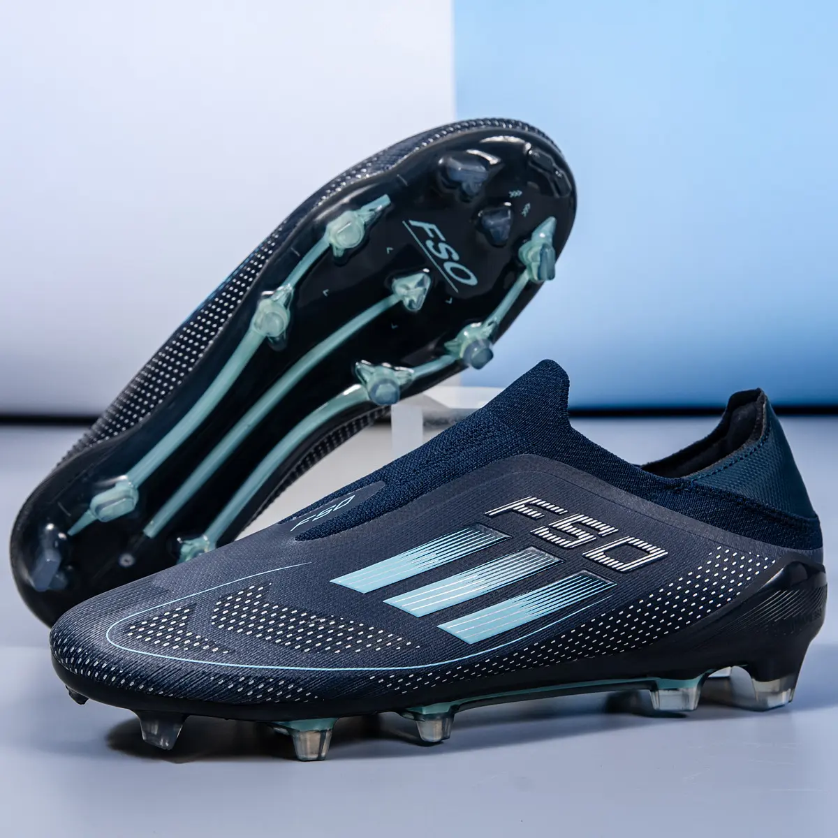 Unisex Slip-On Soccer Cleats with Knit Upper, Low-Top Speed Shoes with FG Long Spikes for Training & Competition on Firm Ground